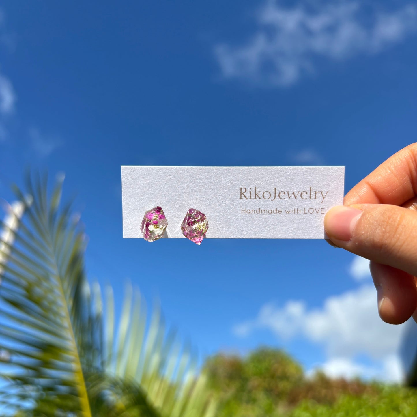 Real flowers in gem shaped stud earrings