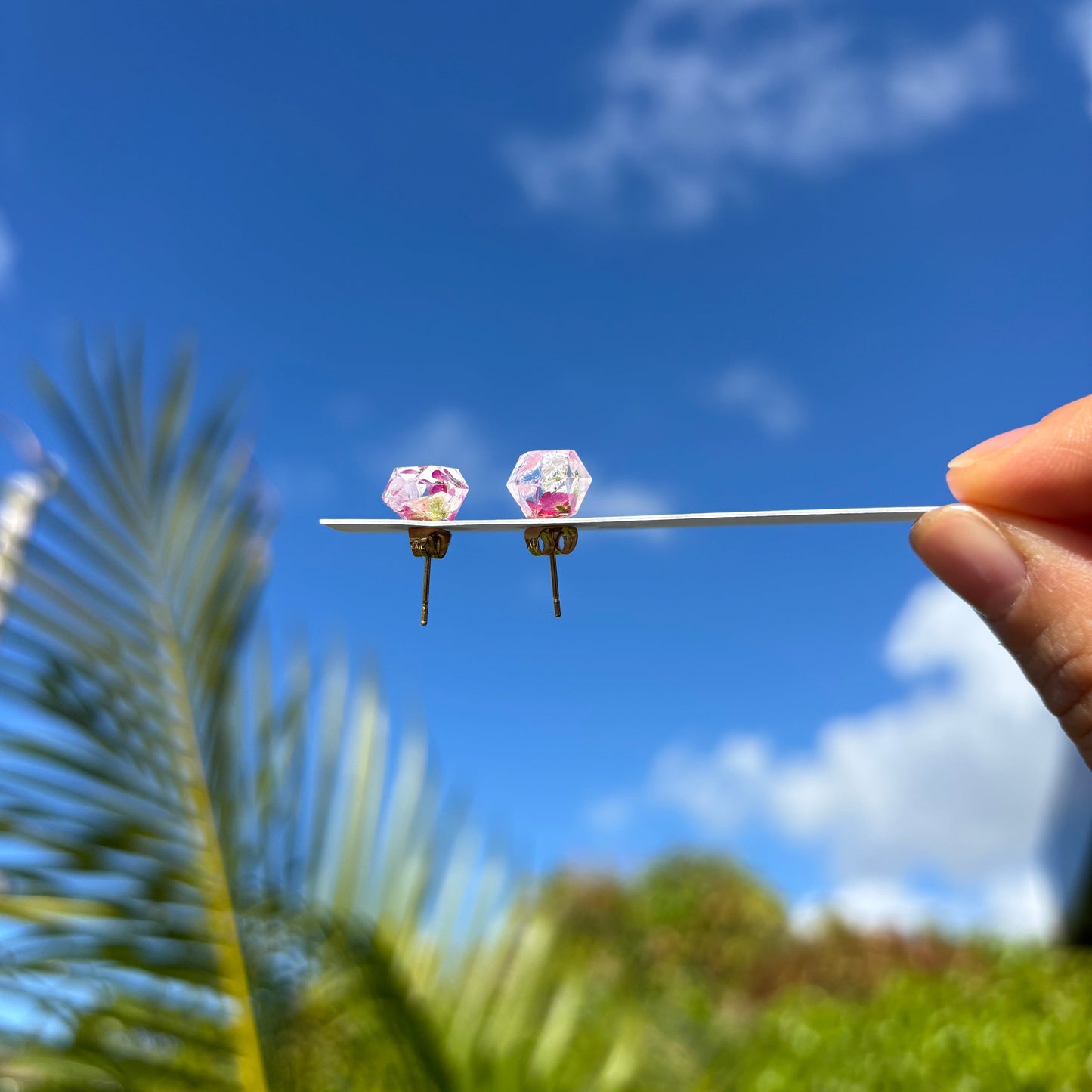 Real flowers in gem shaped stud earrings