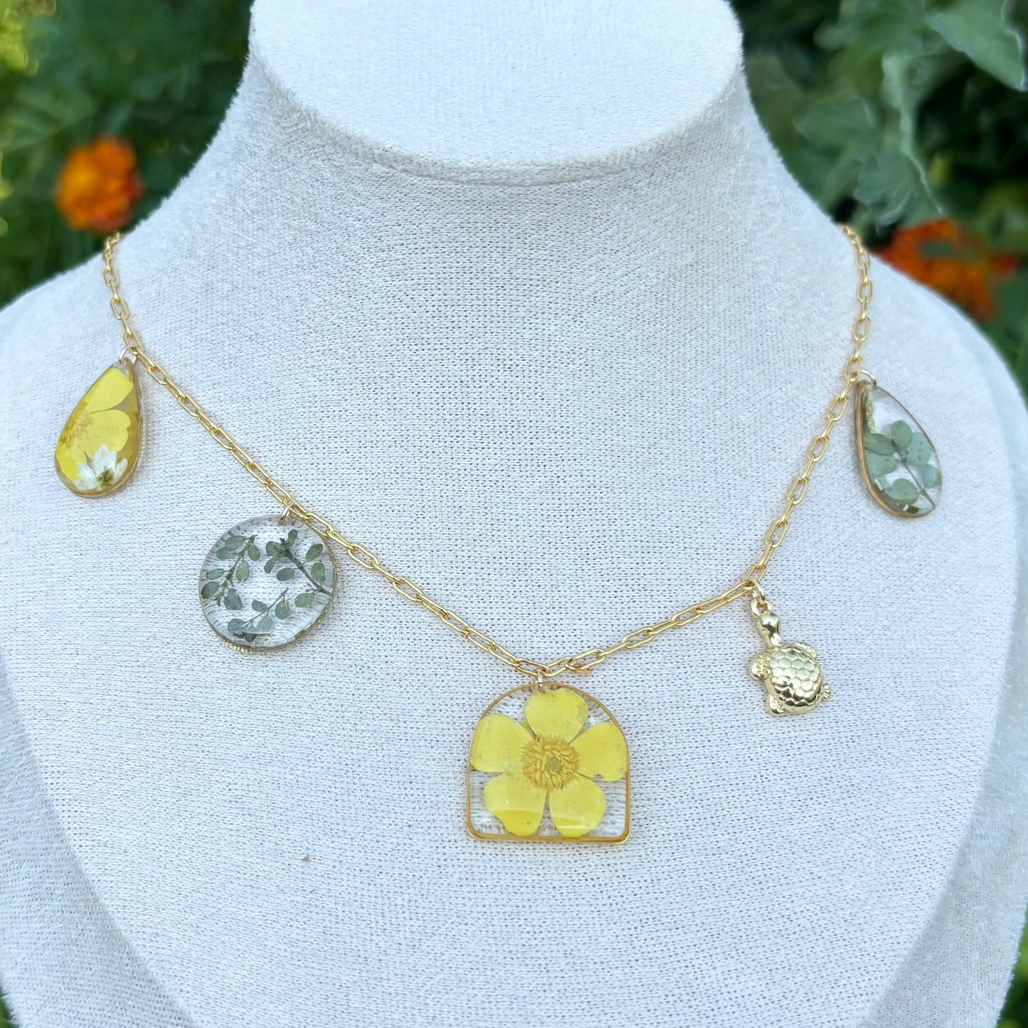 Buttercup flowers and tiny green leaves charm necklace
