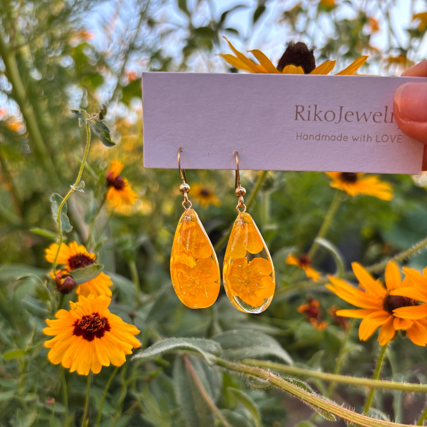Bulbous buttercup flowers teardrop shaped earrings