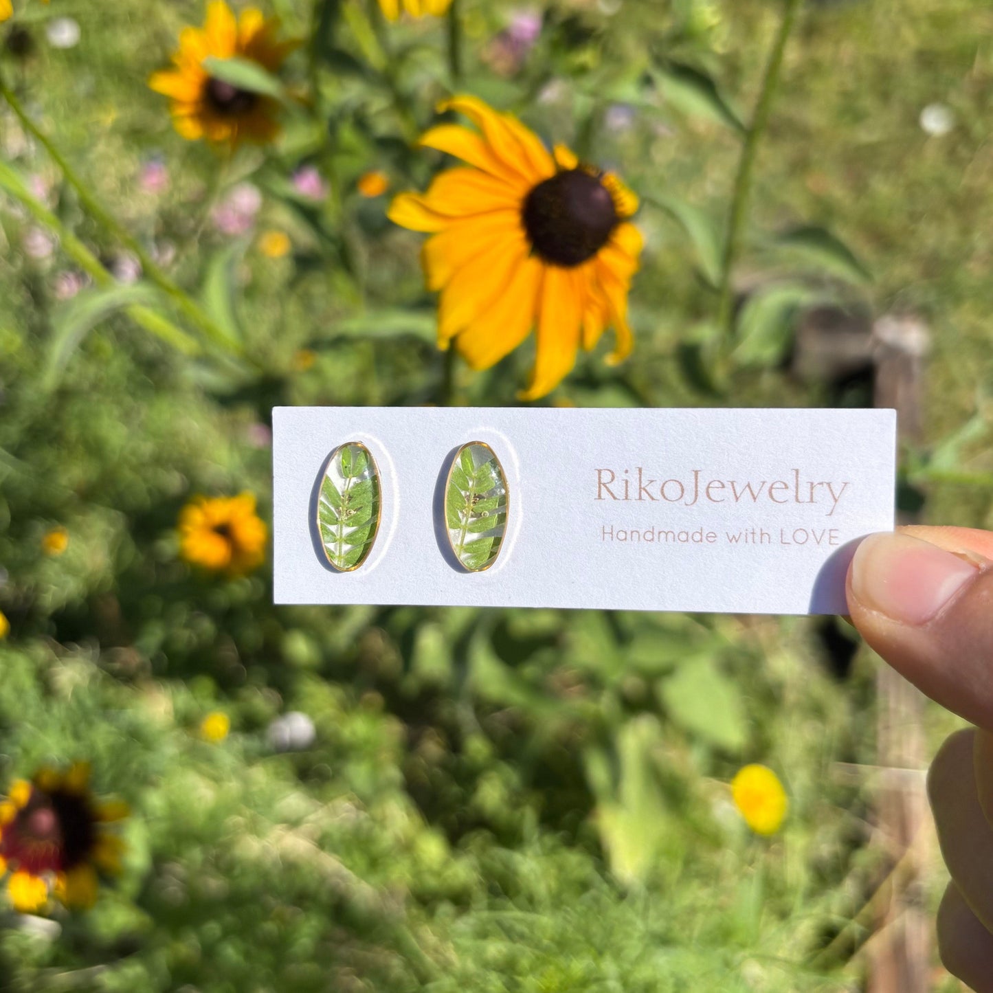 Mini green leaf stud earrings