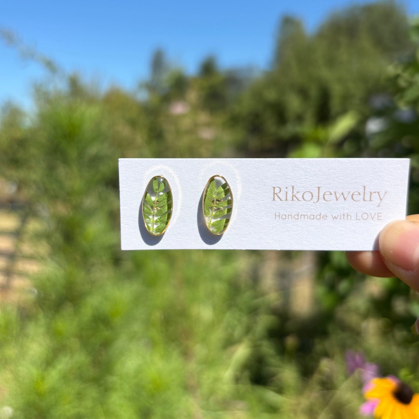 Mini green leaf stud earrings
