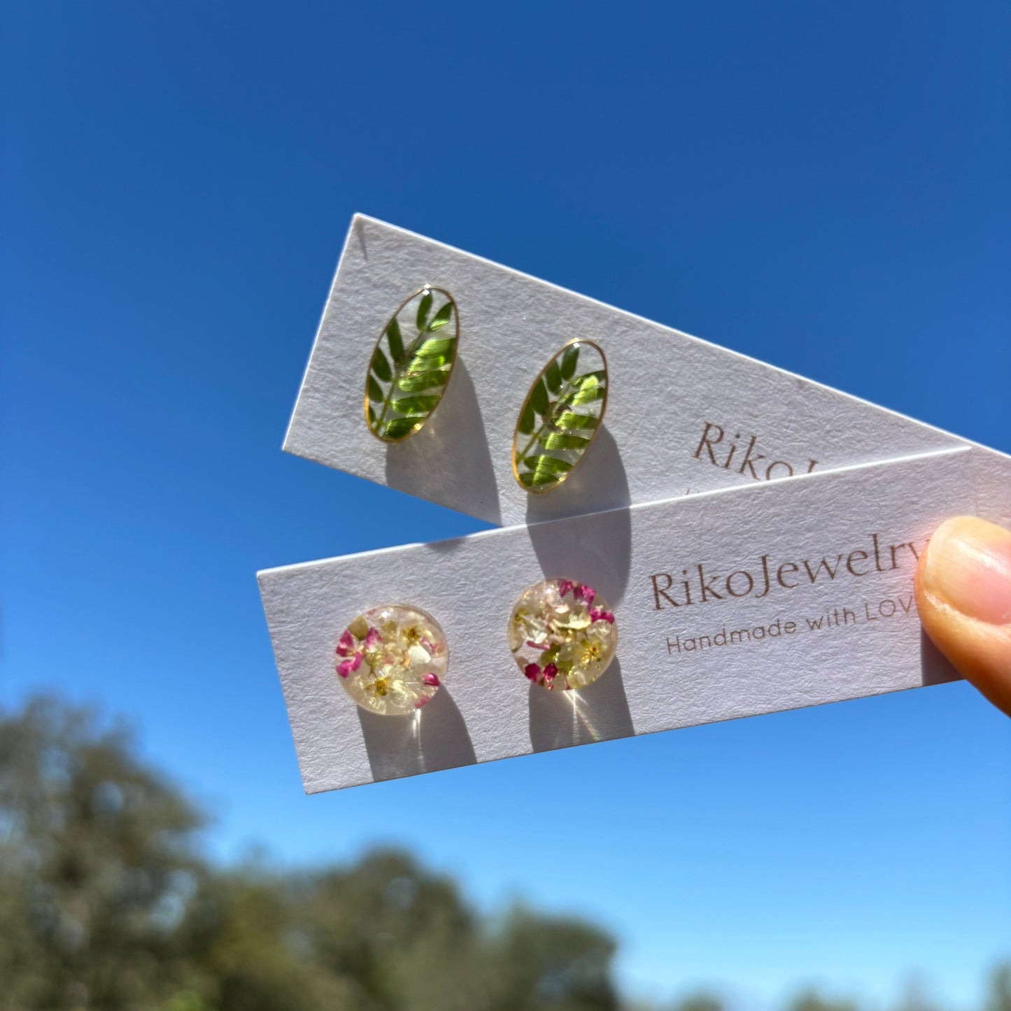 Mini green leaf stud earrings