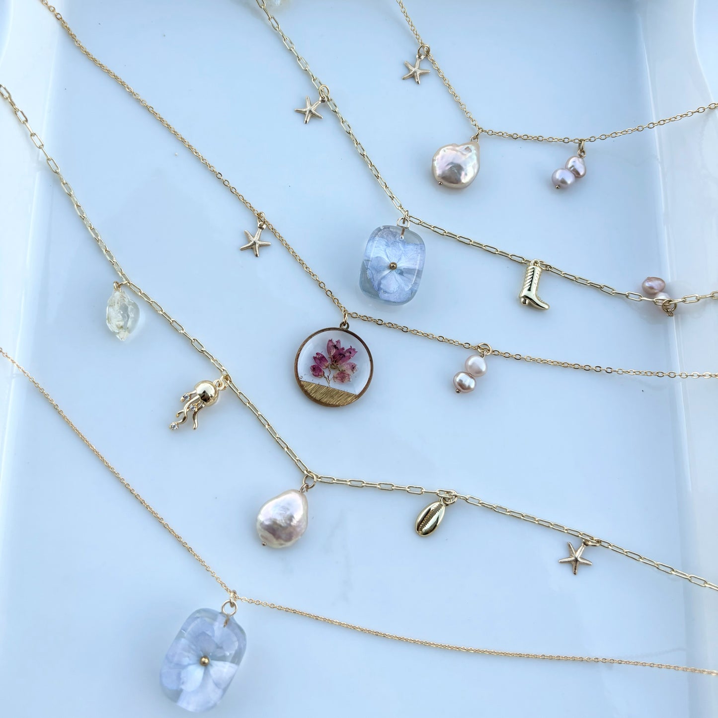 Hydrangea and gold charm necklace