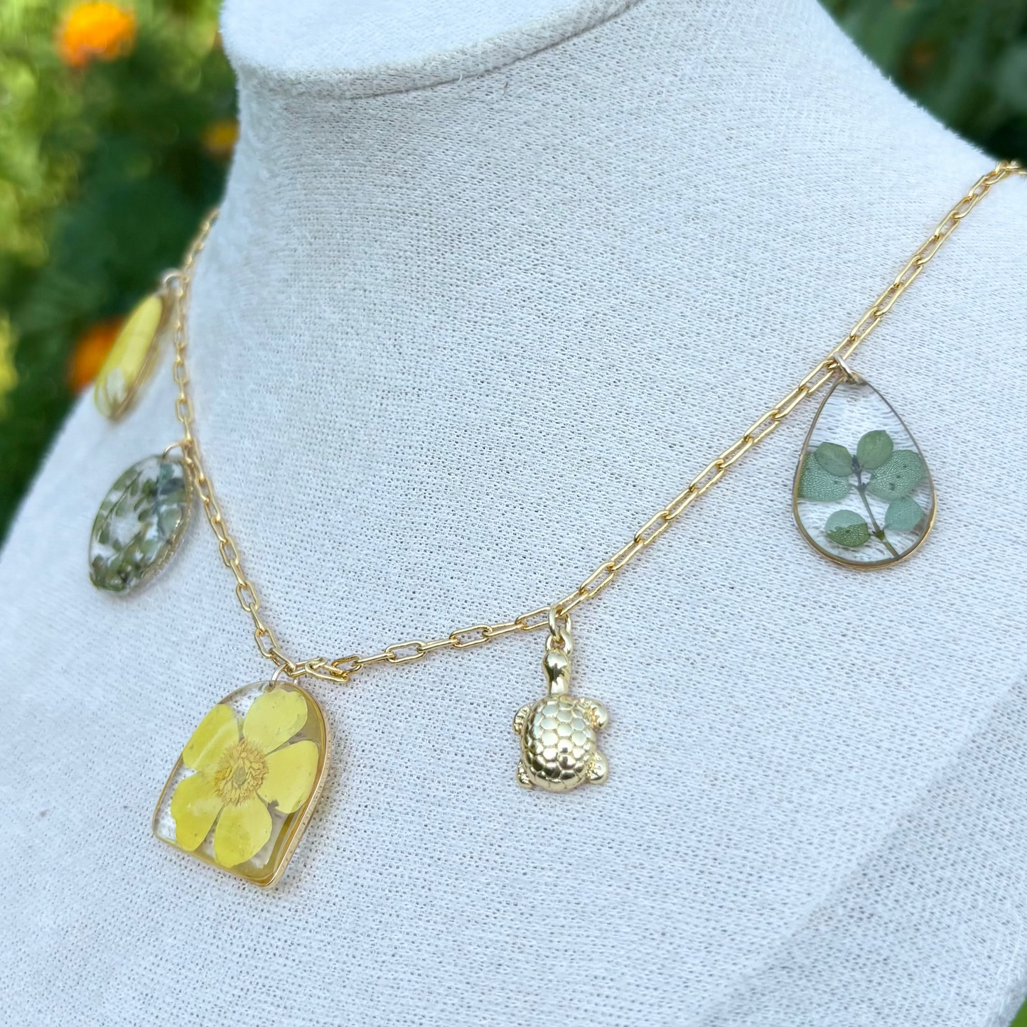 Buttercup flowers and tiny green leaves charm necklace