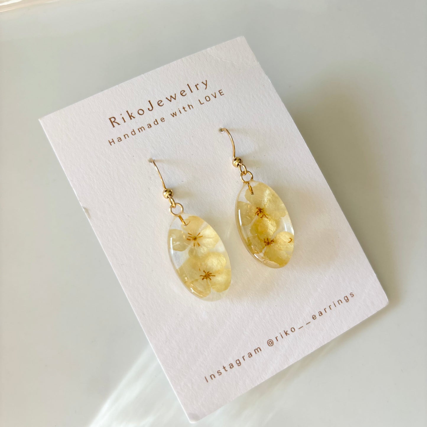 Parish's poppy Oval shaped earrings